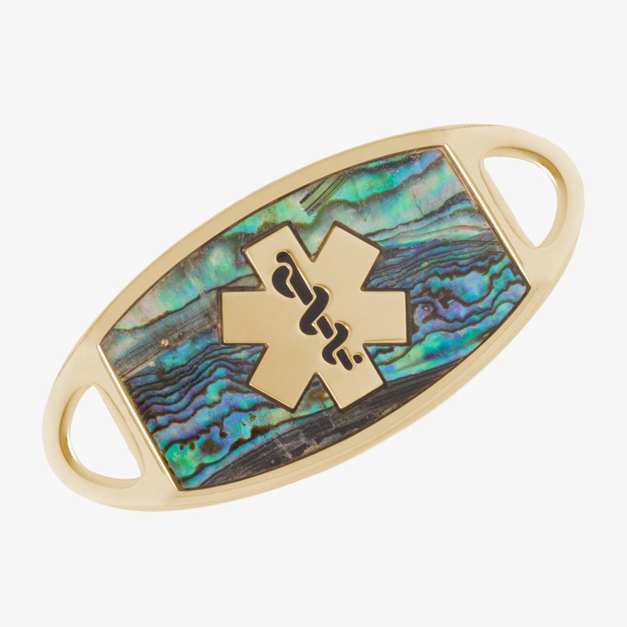 Flat gold tone stainless steel med ID tag with natural abalone inlay and gold tone medical symbol.