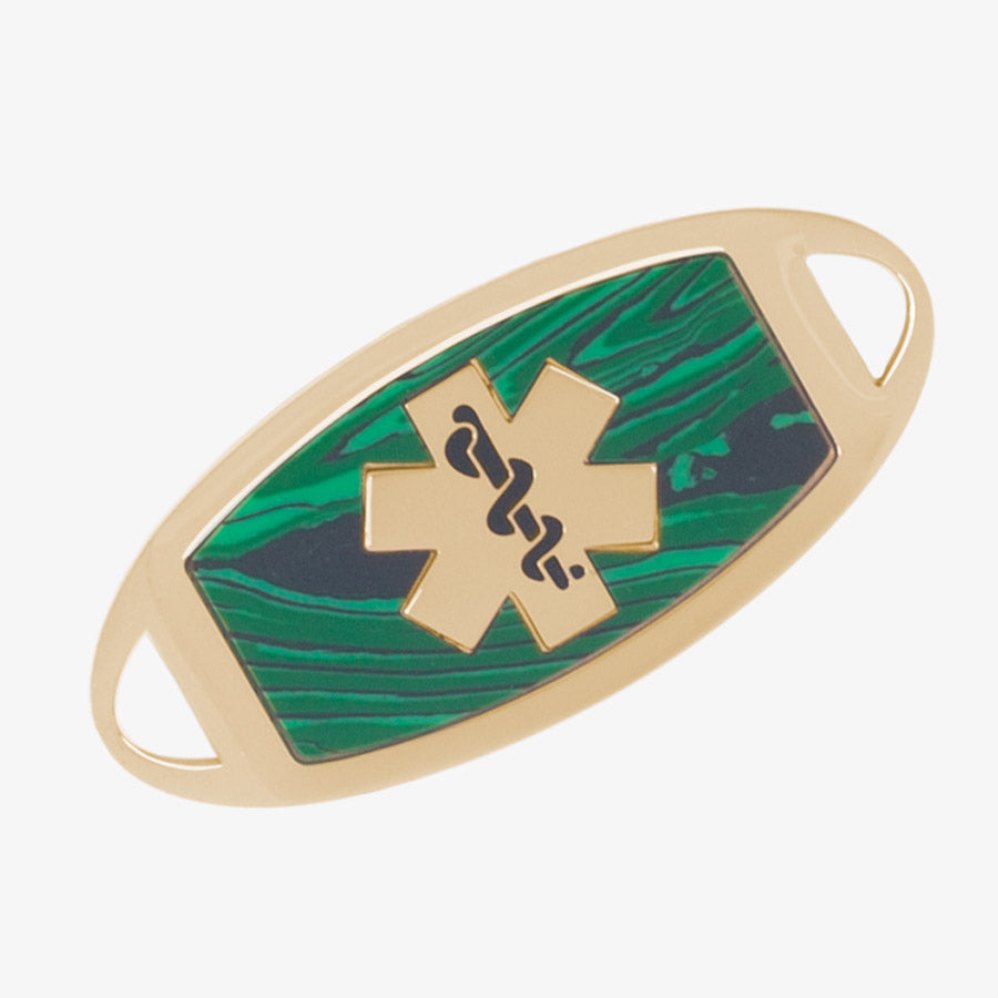 Gold tone stainless steel medical ID tag with malachite inlay and gold tone medical symbol at the center.