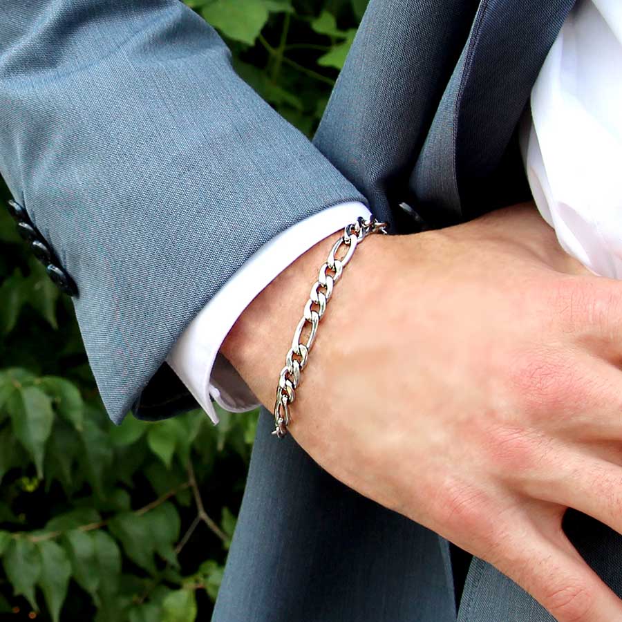 Man wearing the Napoli Medical ID Bracelet with a silver-tone stainless chain with 3/8” x 1/4” and 5/8” x 1/4” links