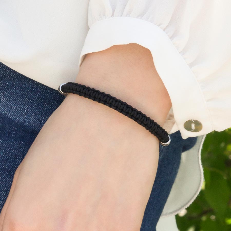 Woman wearing Black Macrame Medical ID Bracelet. Good view of the macrame band. Pairs with any interchangeable med ID tag