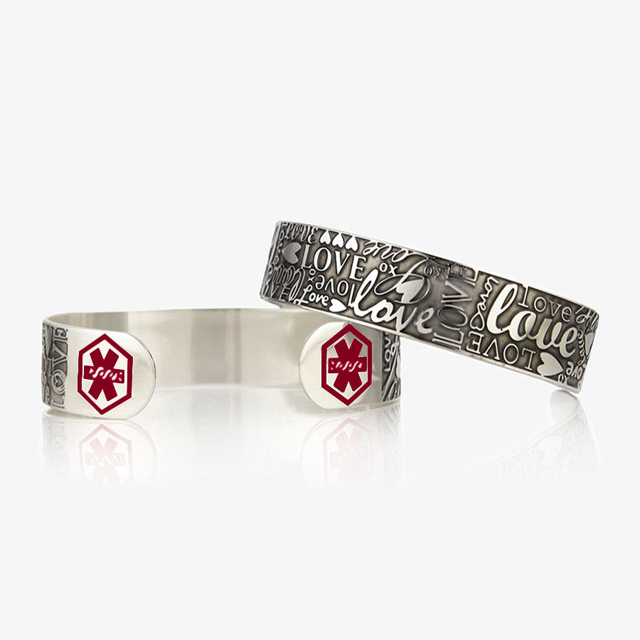 Stainless steel medical alert cuff bracelet with different font styles of the word "Love"