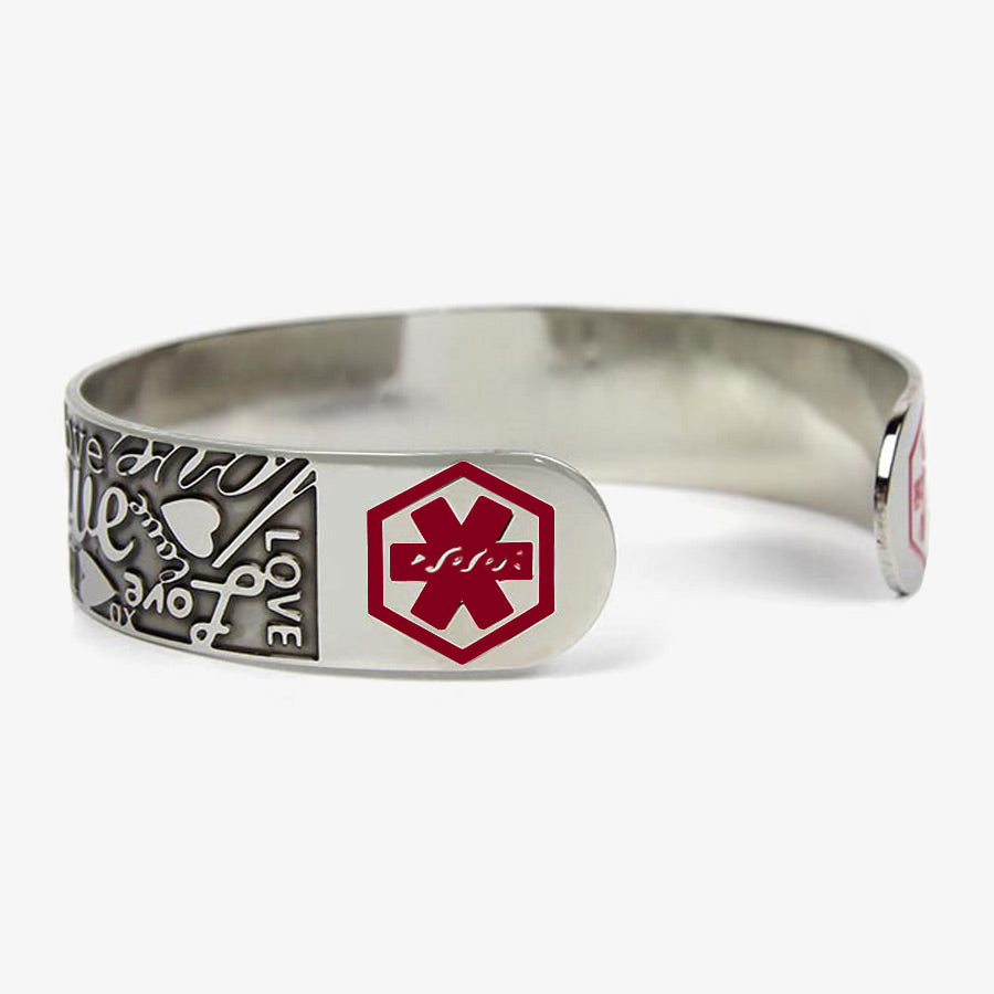 Front of Love Medical ID Cuff with embossed hearts, XO hugs and kisses, the word, "LOVE," in varied prints and scripts