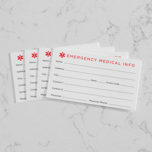 Four Medical ID Wallet Cards, displayed on a White Marble COuntertop