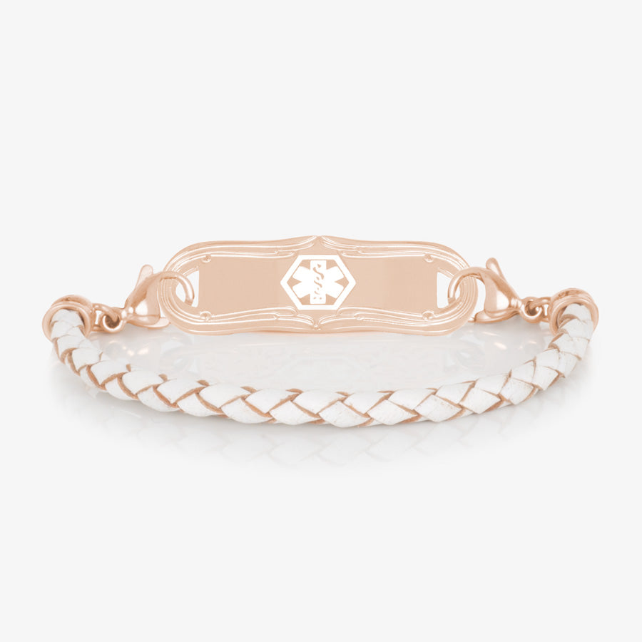 Cream colored braided leather strap with rose tone findings attached to a rose tone ID tag with white icon.