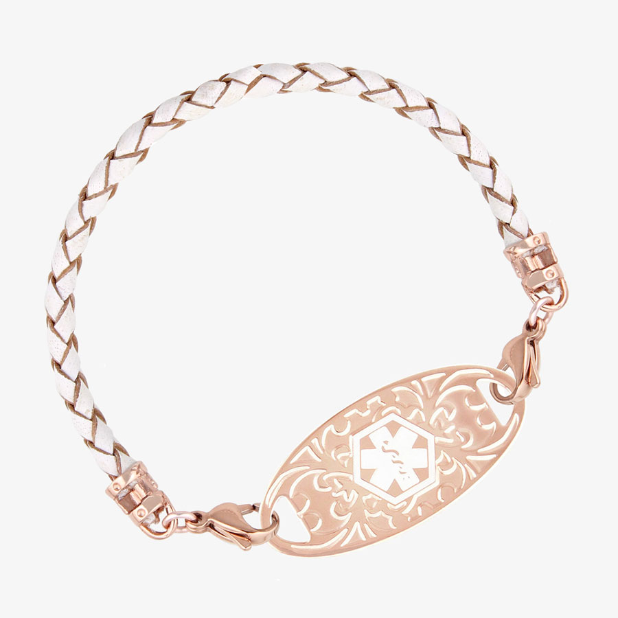 Cream and rose gold tone braided leather med ID bracelet with decorative rose gold tone stainless steel tag with white medical symbol.