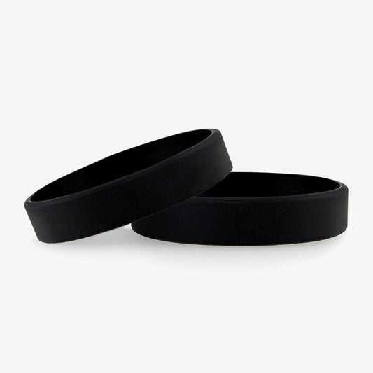 Two stacked slim black silicone wristbands