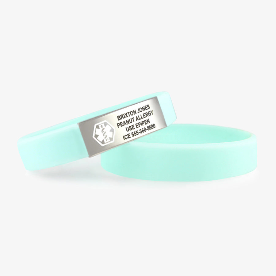 2 Sky Blue ActiveWear Slim Medical ID Bracelets. 2 blue silicone circle bands, one with stainless plaque with white caduceus