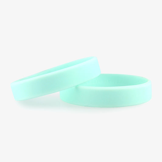 Stack of two sky blue silicone replacement wristbands, shown without med ID tags