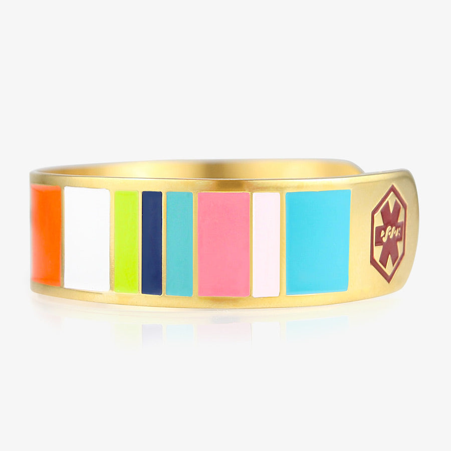 Front and Back of Key West Medical ID Cuff with yellow gold background, multi-color blocks, red caduceus each end. Engraving