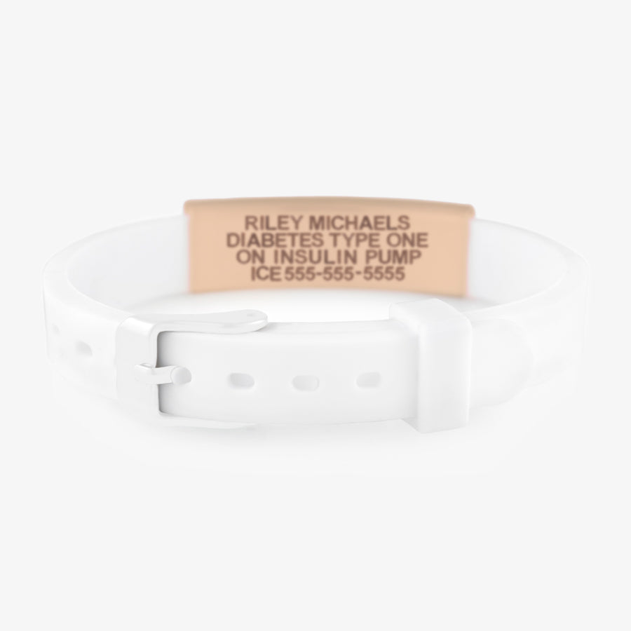 White silicone alert bracelet with watch style closure and rose gold medical alert tag