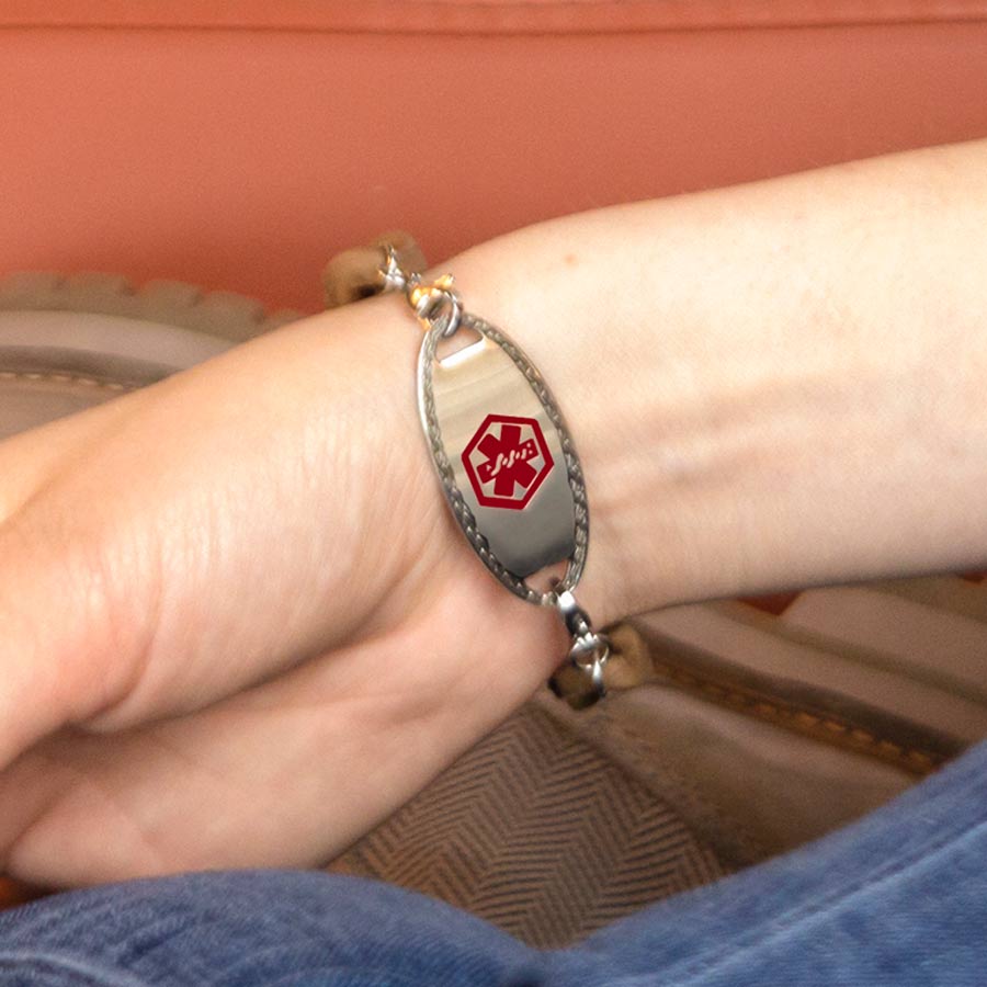 Woman wearing silver silicone Medical ID Bracelet 