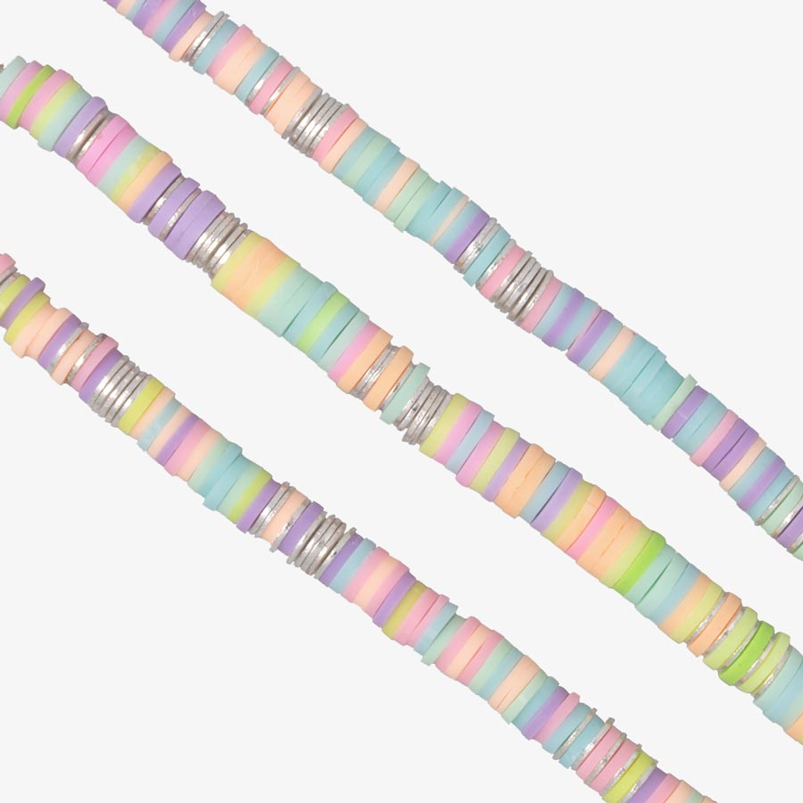 Close up image of pattern variation in mutlicolored pastel disc beads. 