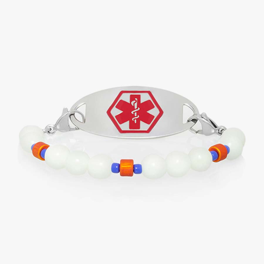 Camping-inspired boy's medical ID bracelet with round glow-in-the-dark beads, orange and blue accent beads, and silver tag with red symbol.