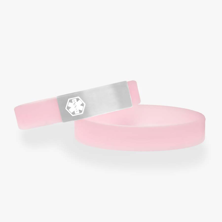 Glow-in-the-dark soft pink silicone slip-on bracelet with silver tone stainless medical alert tag with white caduceus.