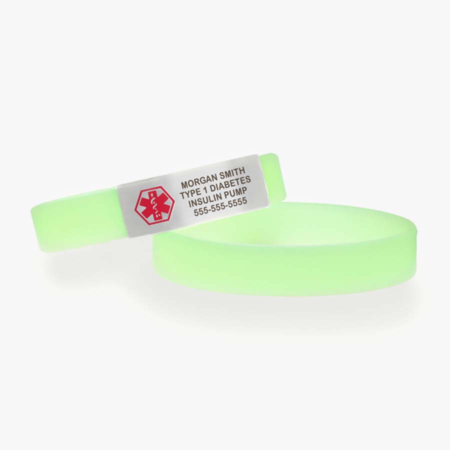 Glow-in-the-dark green silicone slip-on bracelet with silver tone stainless medical alert tag with custom engraving and red caduceus.