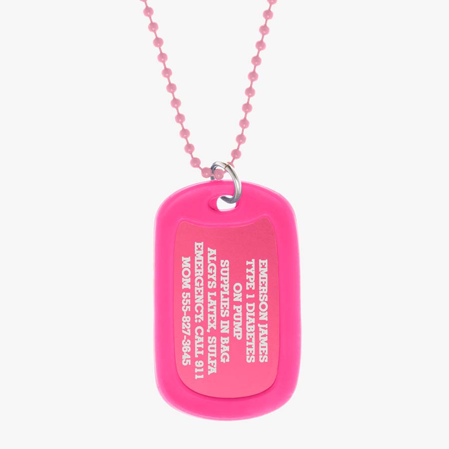 Bright pink aluminum dog tag with engraving example and coordinating silicone silencer on matching stainless steel ball chain.