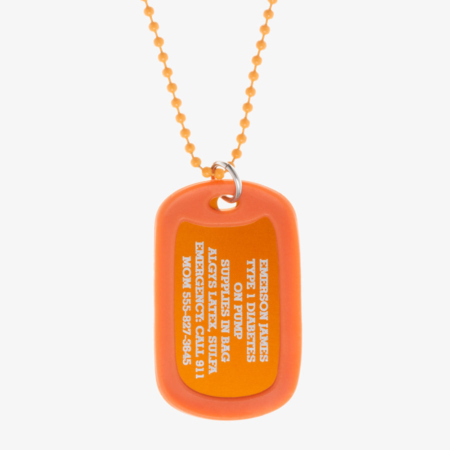 Carrot aluminum dog tag with engraving example and coordinating silicone silencer on matching stainless steel ball chain.