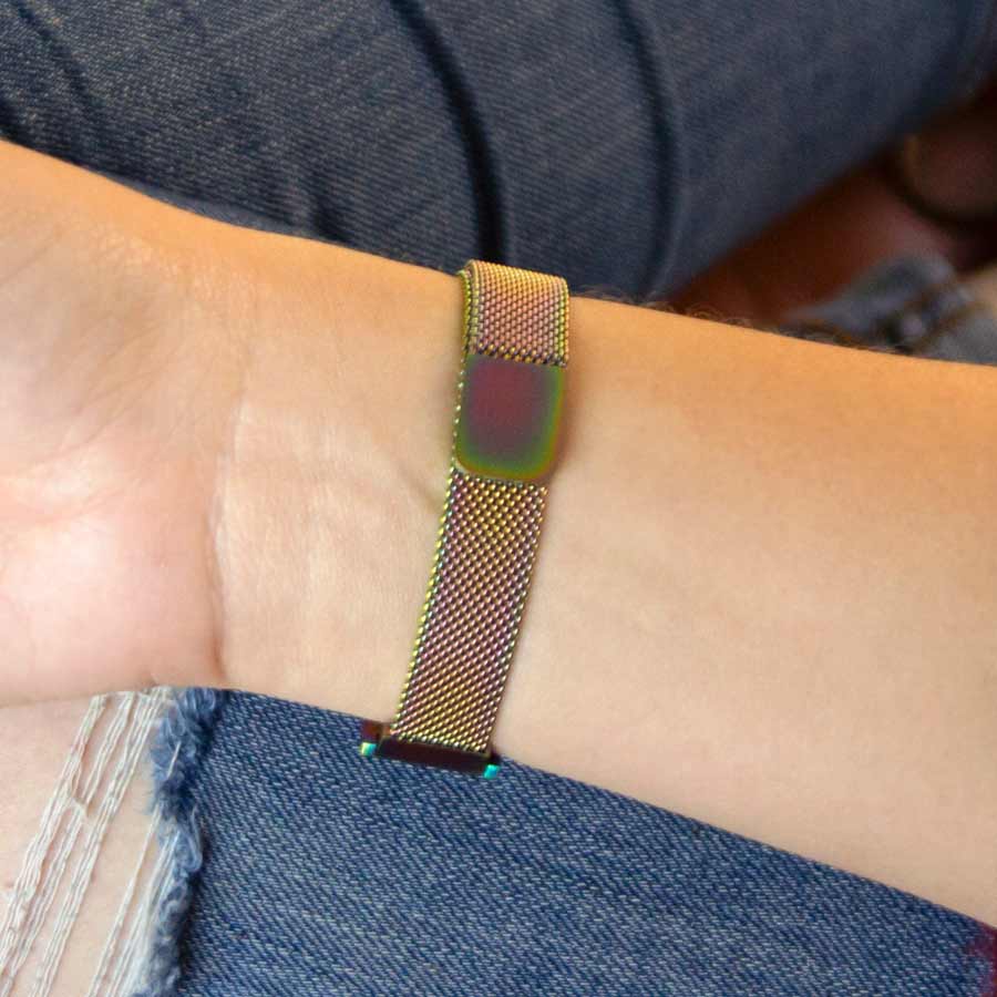 Woman showing magic finish medical ID bracelet with magnetic clasp