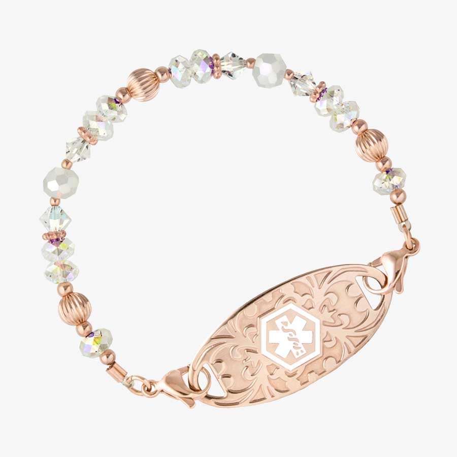 Krista Stretch Bracelet with rose gold beads and crystals and a rose gold tag with white medical ID symbol