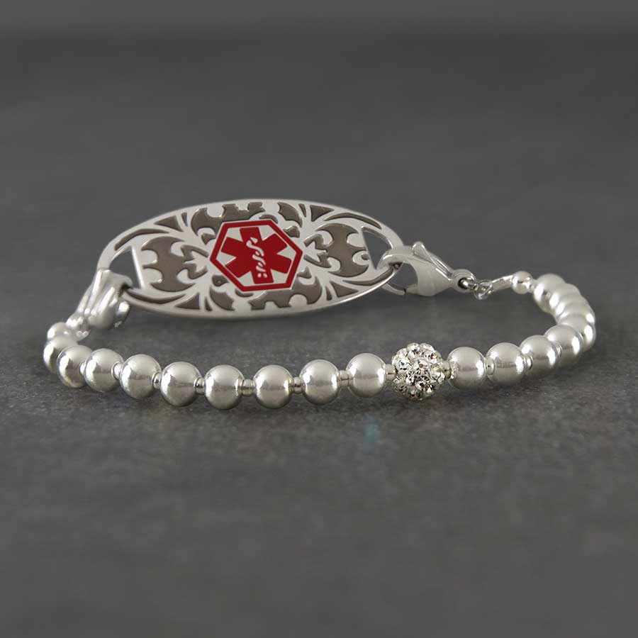 B654 - Olivia Stretch Bracelet with silver beads and red medical symbol on slate