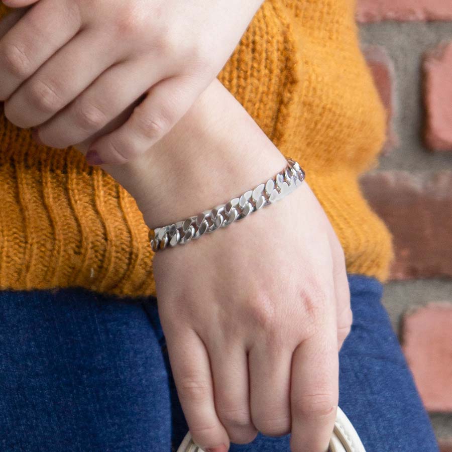 Woman wearing sterling silver medical alert bracelet chain