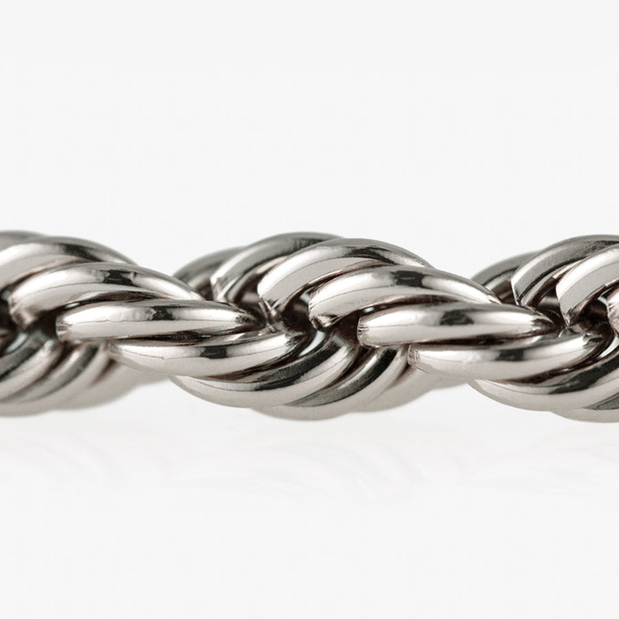 Detail shot of silver tone rope chain bracelet