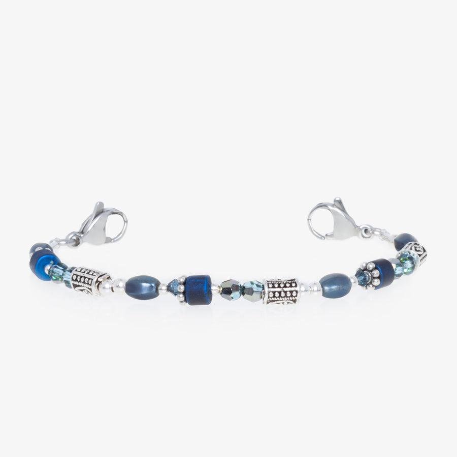 Blue and silver beaded medical ID bracelet on jewelry elastic with stainless steel lobster clasps on each end.