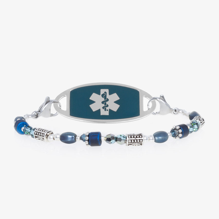 Blue and silver beaded medical ID bracelet on jewelry elastic with stainless steel lobster clasps and sapphire blue decorative med ID tag.