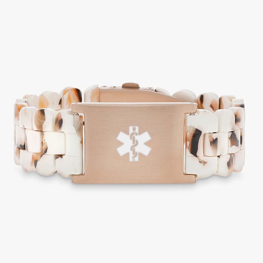 Cream and rose gold medical ID bracelet with resin band.