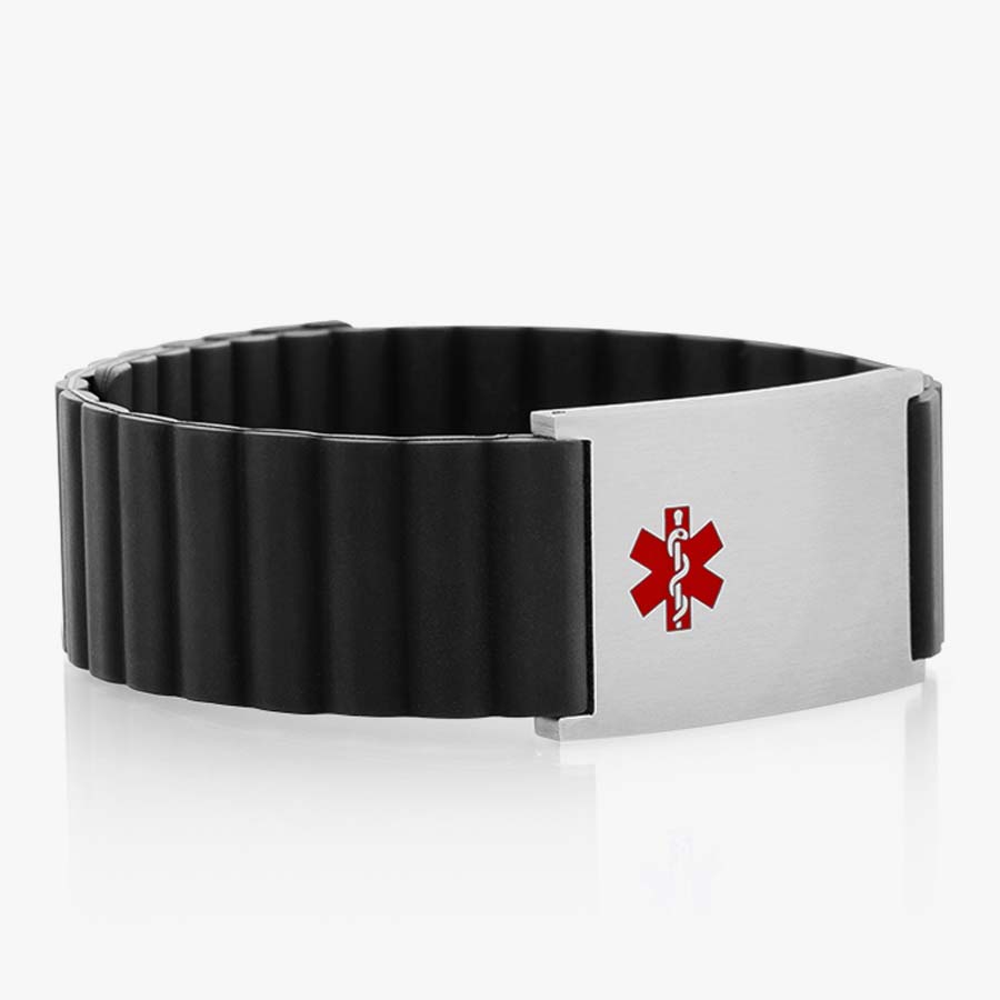 Low side angle of black silicone, magnetic band with a silver tag and red caduceus symbol. 