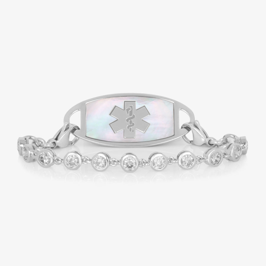 Rhodium and palladium plated women&#39;s medical alert bracelet with clear, round, bezel set cubic zirconia crystals paired with stainless steel mother of pearl inlay medical ID tag.