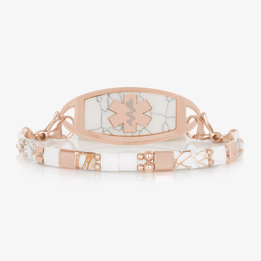 White and Rose Gold beaded stretch medical ID bracelet paired with rose gold tone stainless steel medical ID tag with Howlite inlay and rose gold tone medical symbol.