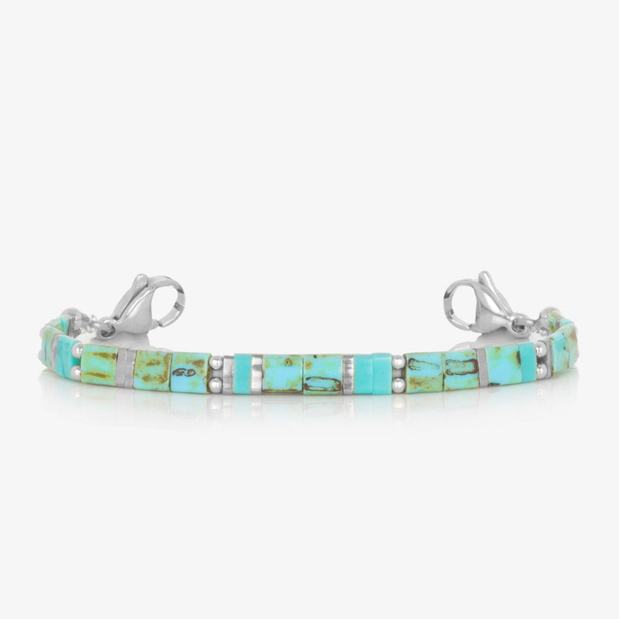 Turquoise and sterling silver beaded stretch medical alert bracelet.