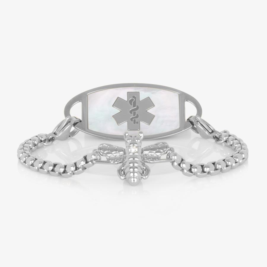 Silver toned box chain bracelet featuring a honey bee centerpiece with crystal. Attached to a silver tones medical ID tag featuring inlaid mother of pearl.