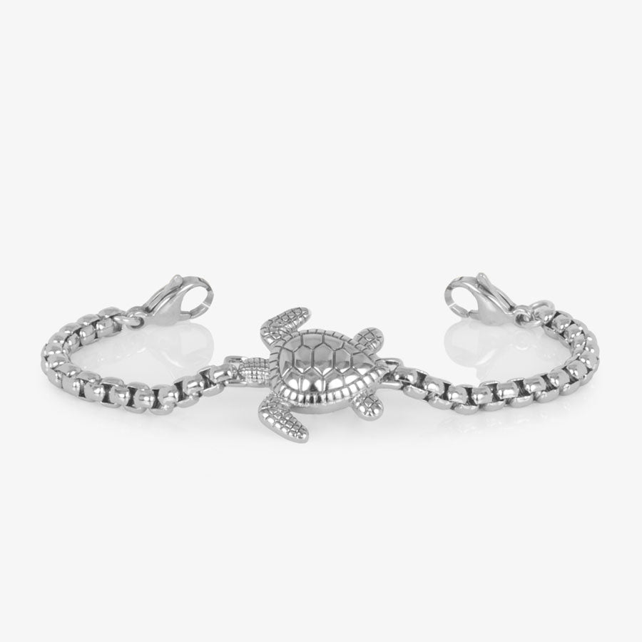 Silver box chain bracelet featuring a sea turtle centerpiece