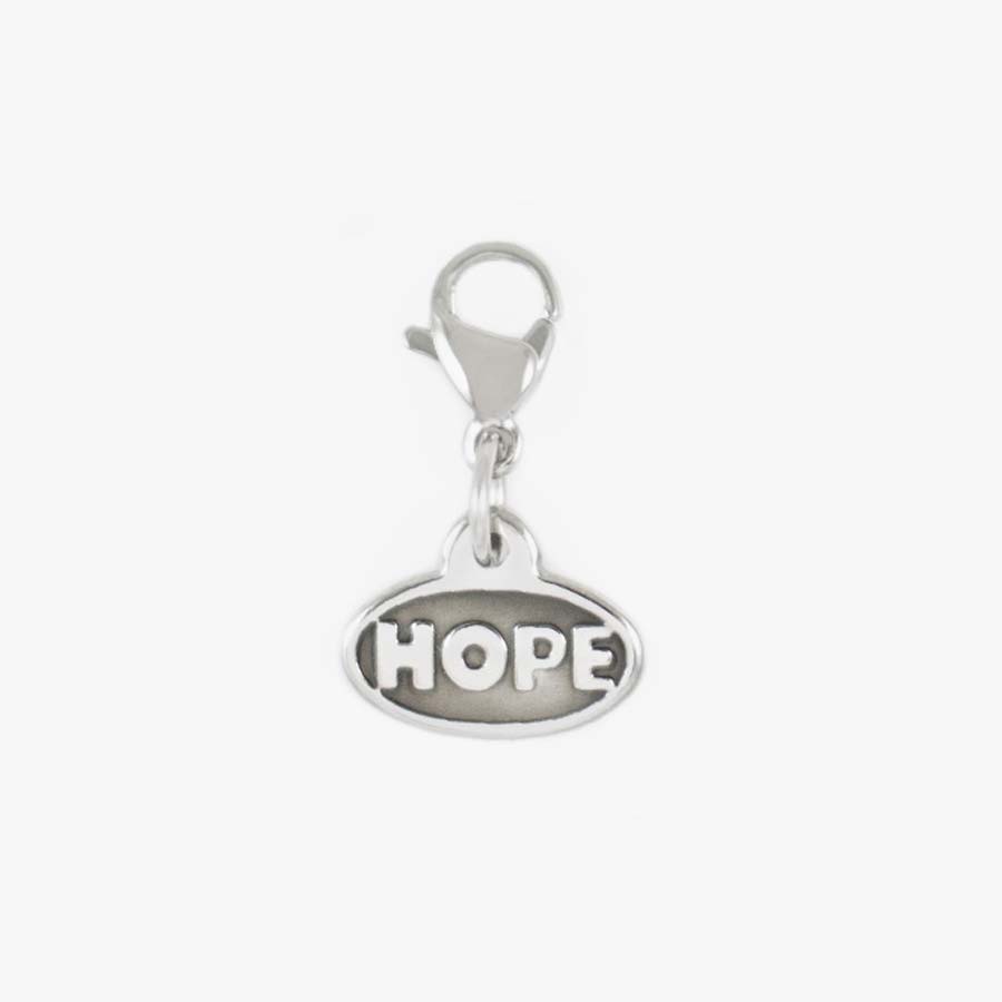 2-sided Silver Tone Hope Charm. Stainless charm with the word, “hope” in block letters on the back side. With lobster clasp