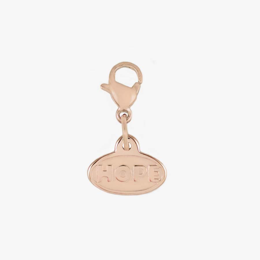 Back of the 2-sided Rose Gold Tone Hope Charm with the word, “Hope” in bold block letters. With lobster clasp to move easily