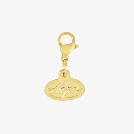 Gold tone lobster clasp and oval shaped charm with the word HOPE in script lettering.