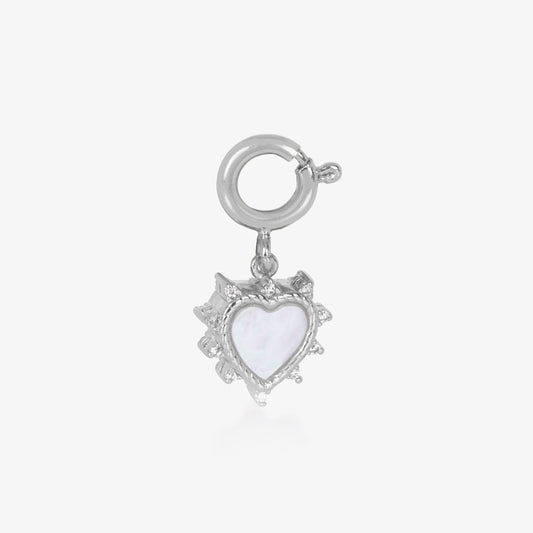 Silver, heart shaped charm with a mother of pearl inlay, surrounded by crystals.