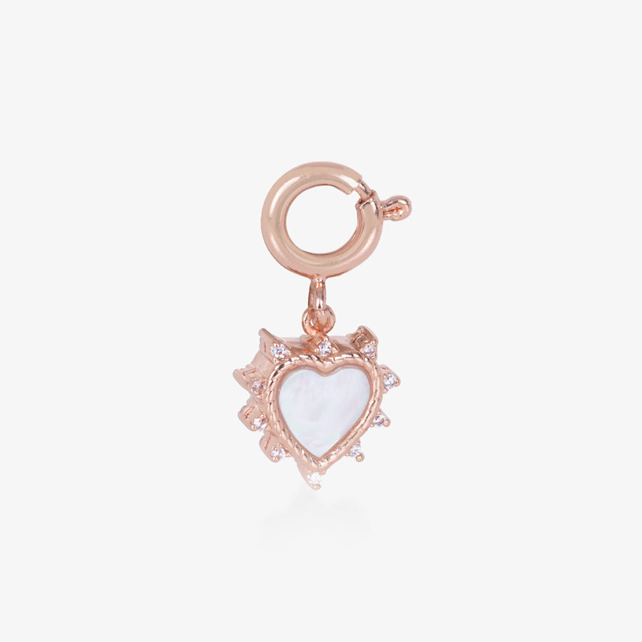 Rose Gold, heart shaped charm, inlaid with other of pearl and bordered by crystals.