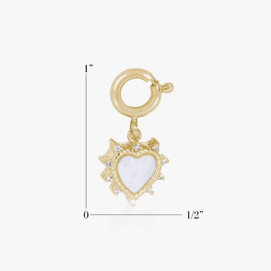 Heart shaped charm in gold measuring one inch tall and a half in wide.