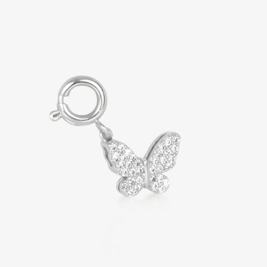 Silver toned, butterfly shaped, charm inlaid with crystals on front and back.