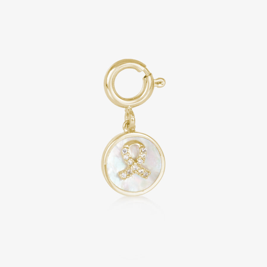 Gold tone round charm with mother of pearl inlay and gold awareness ribbon with inset crystals