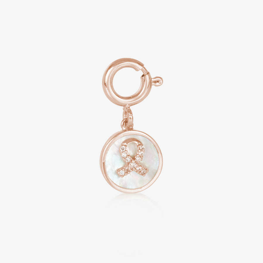 Rose gold tone round charm with mother of pearl inlay and rose gold awareness ribbon with inset crystals