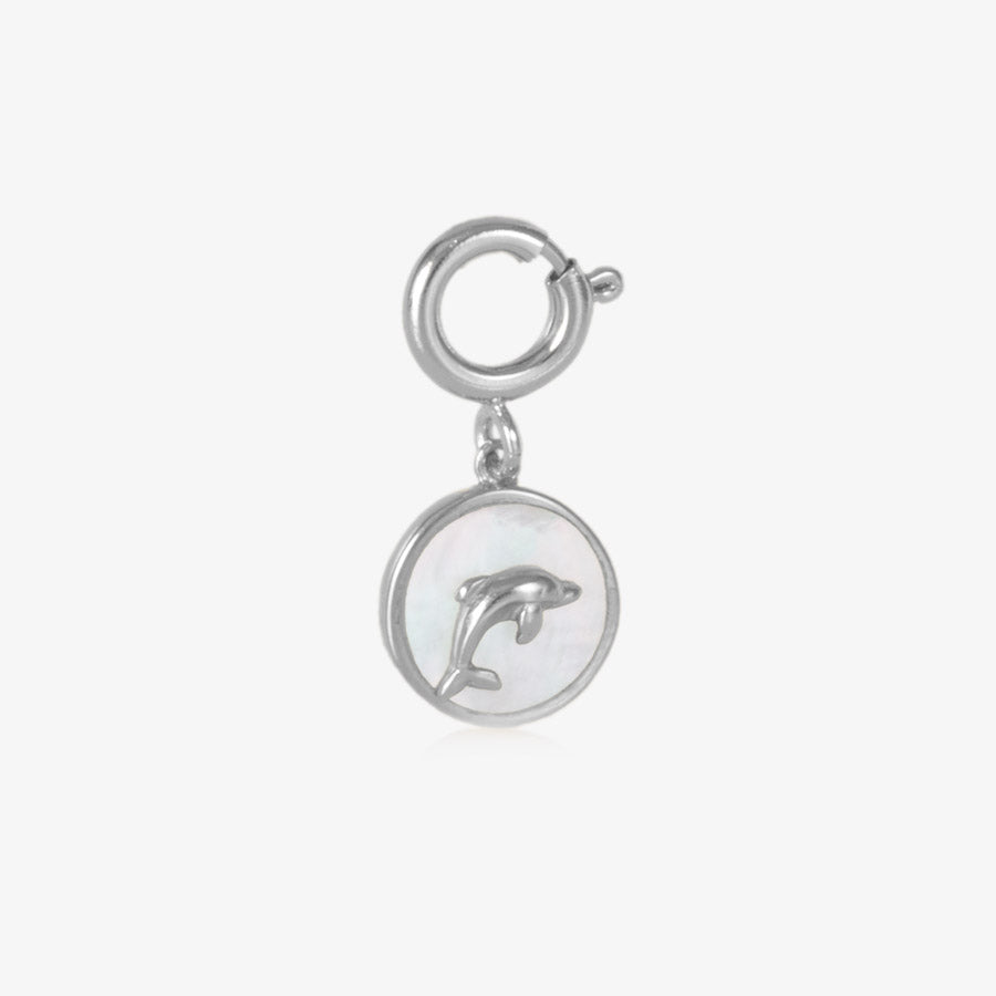 Round, silver charm with a silver dolphin inset on an inlay of mother of pearl