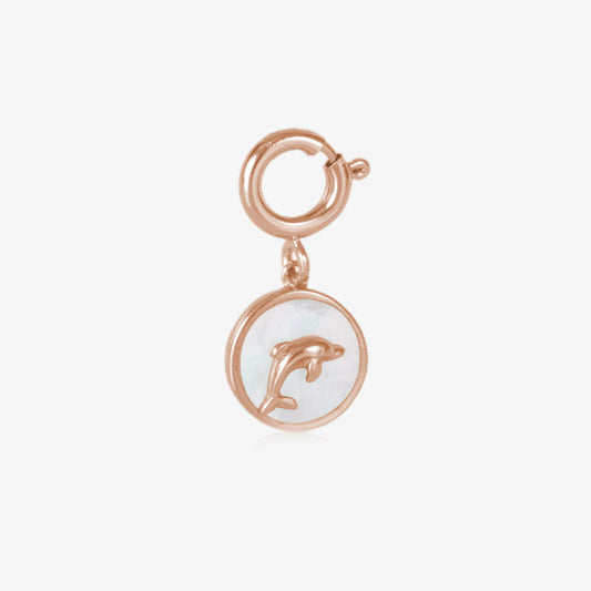 A rose gold tones, circle shaped charm, featuring a rose gold tones dolphin on a field of inlaid mother of pearl