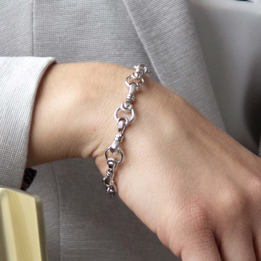 Woman wearing sterling silver bridle chain medical ID bracelet