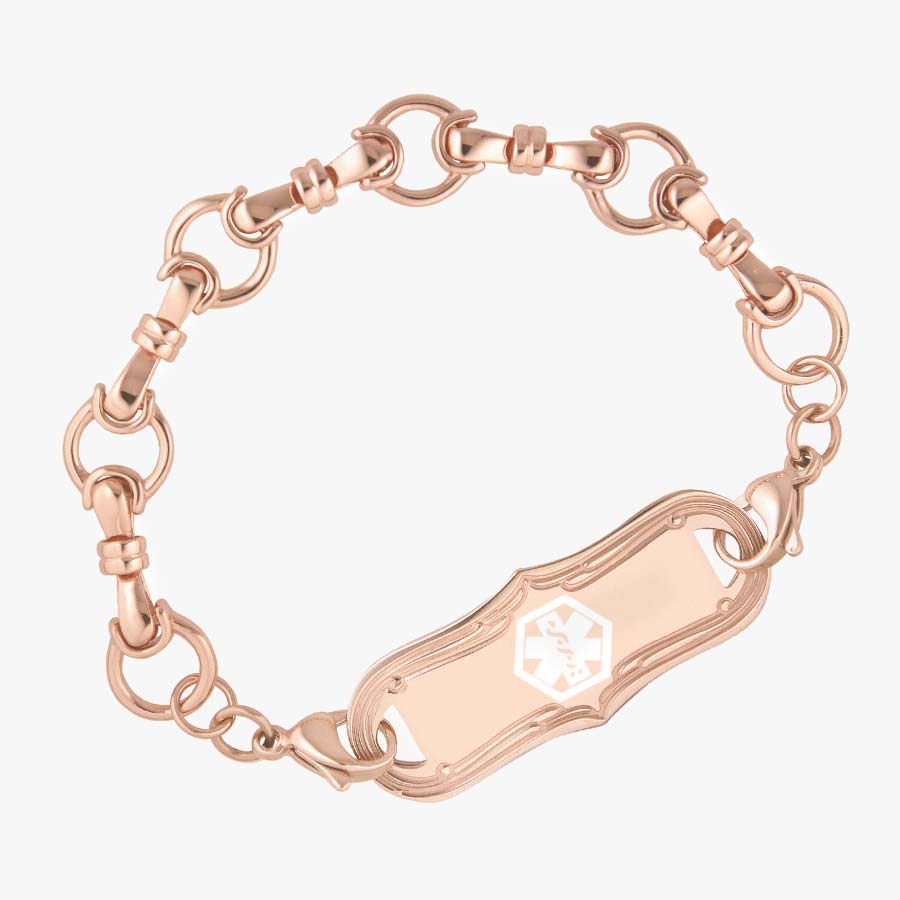 Bridle chain in rose gold on white background with medical alert tag