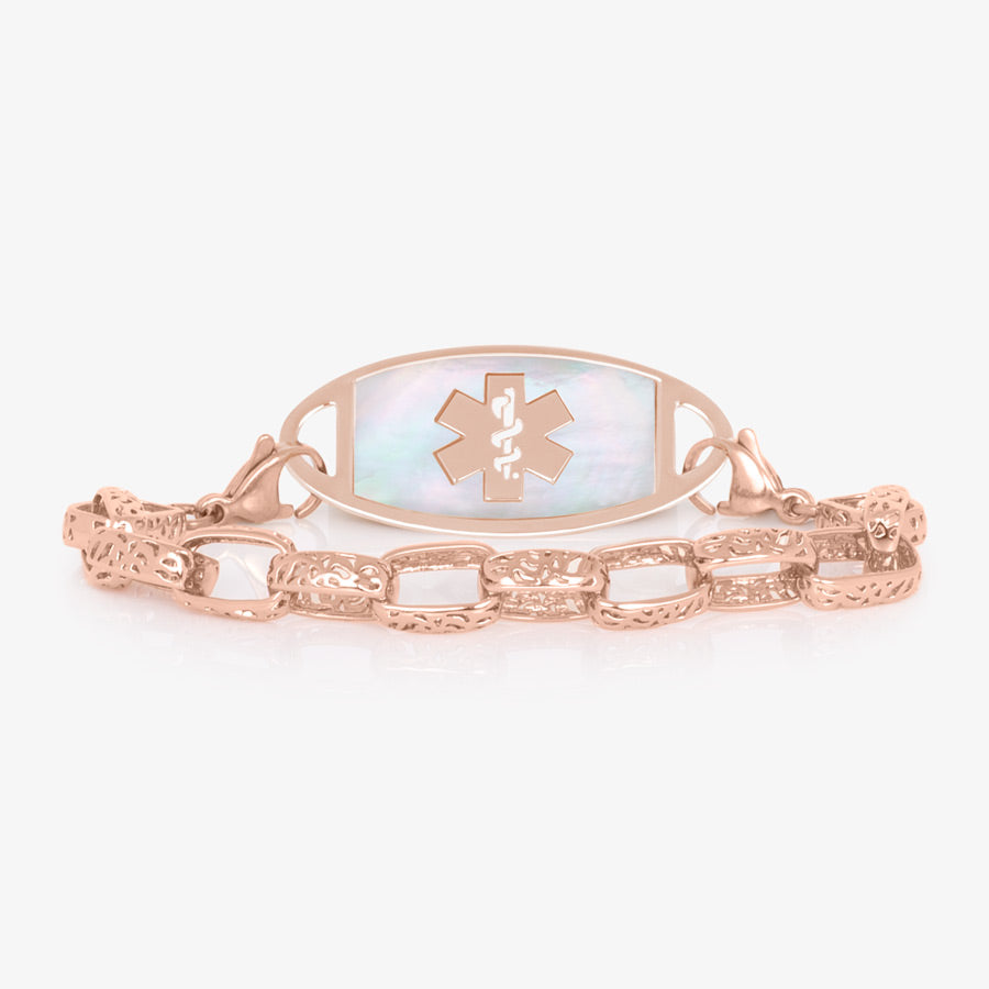 Rose gold plated detailed oval link chain paired with rose gold tone stainless steel medical ID tag with mother of pearl inlay and coordinating rose gold tone medical symbol.