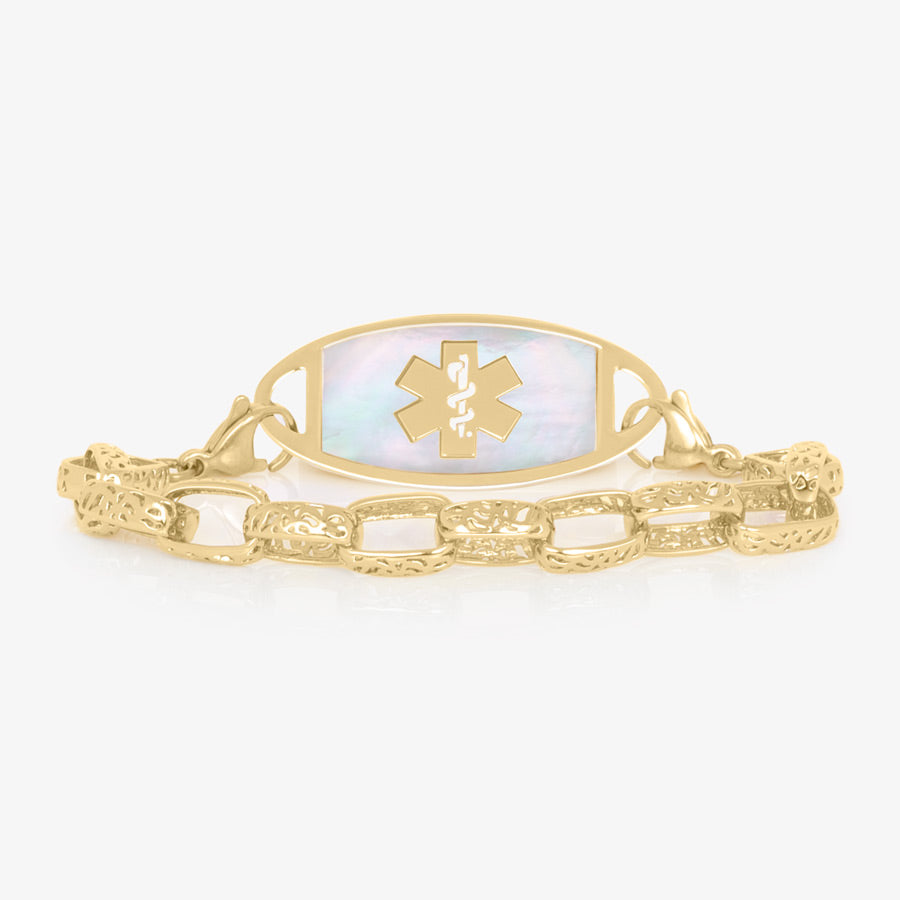 12 karat gold plated cutout detailed oval link chain with gold tone stainless steel medical ID tag with mother of pearl inlay and gold tone medical symbol.